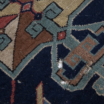 Lot 184 - Caucasian blue ground rug with central panel...
