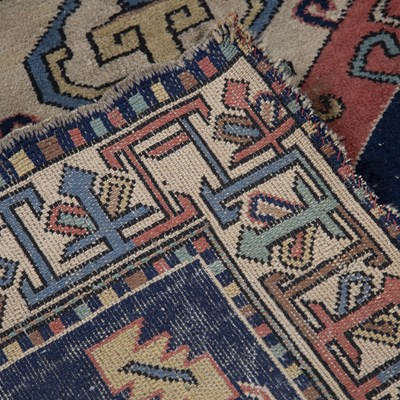 Lot 184 - Caucasian blue ground rug with central panel...