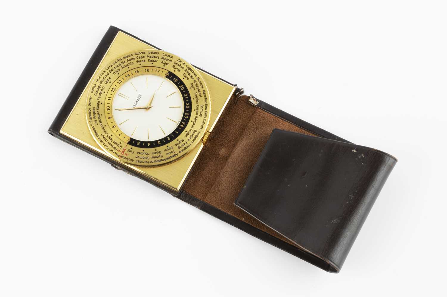 Lot 130 - A Luxor 'world time' travel clock, in folding...