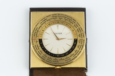 Lot 130 - A Luxor 'world time' travel clock, in folding...