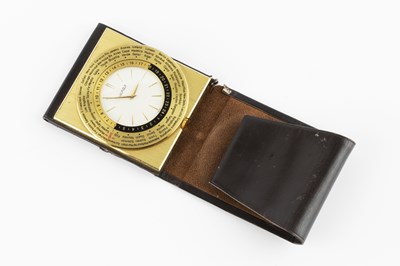 Lot 130 - A Luxor 'world time' travel clock, in folding...