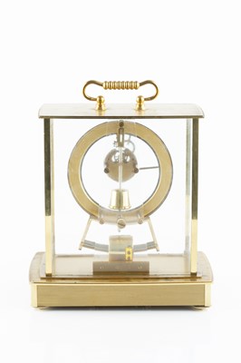 Lot 134 - A Kundo electro-magnetic skeleton mantel clock,...