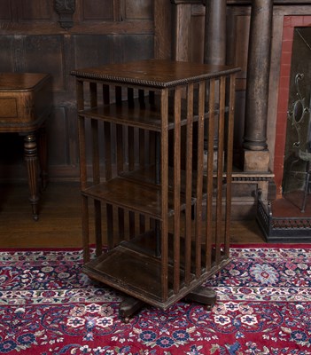 Lot 41 - An Edwardian oak revolving bookcase, with...