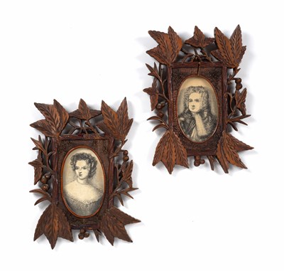 Lot 302 - A pair of Black Forest carved and pierced...