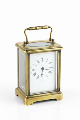 Lot 154 - A French brass carriage timepiece, with white...