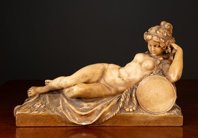 Lot 84 - A terracotta sculpture after Clodion Reclining...