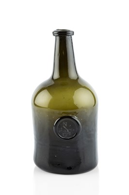 Lot 76 - A sealed and dated wine bottle, squat cylinder,...