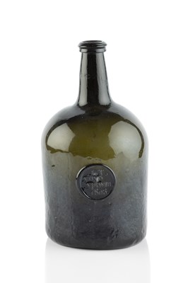 Lot 77 - A Welsh sealed and dated wine bottle, squat...