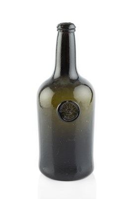 Lot 87 - A sealed wine bottle, seal stamped with a lion...