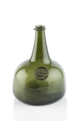 Lot 98 - A sealed and dated wine bottle, transitional...