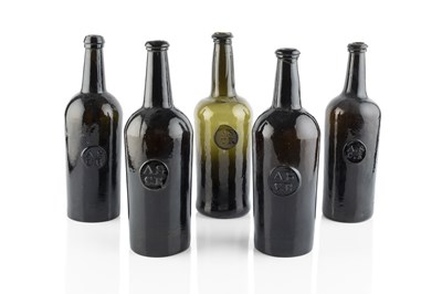 Lot 102 - A group of five sealed wine bottles, cylinders,...