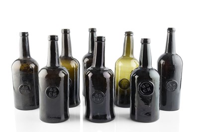 Lot 104 - A group of eight sealed wine bottles,...