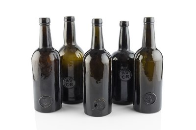 Lot 107 - A group of five sealed wine bottles, cylinders,...