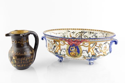 Lot 167 - A Faience oval jardiniere, painted with a...