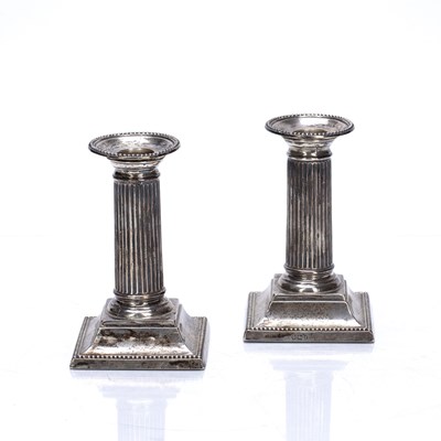 Lot 508 - Matched pair of silver Corinthian column...