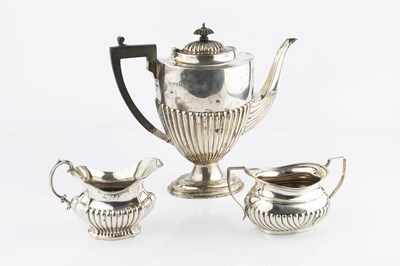 Lot 405 - A silver coffee pot, of half lobed urn form,...