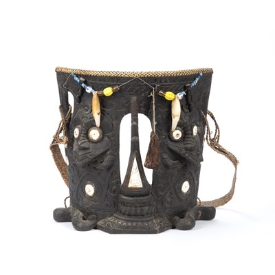 Lot 322 - A Dayak ceremonial carved wood baby carrier,...