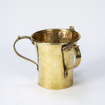 Lot 229 - A Russian Arts and Crafts style brass...