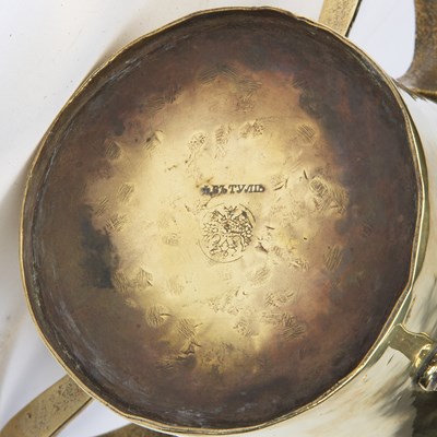 Lot 229 - A Russian Arts and Crafts style brass...