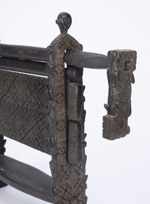 Lot 329 - Tribal interest, two carved wood cotton gins...