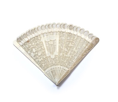 Lot 283 - A 19th century ivory fan, of pierced form...