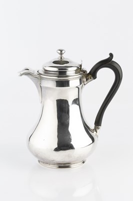 Lot 366 - A George IV silver hot water pot, of baluster...