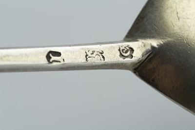 Lot 421 - A James I silver seal top spoon, engraved 1606...