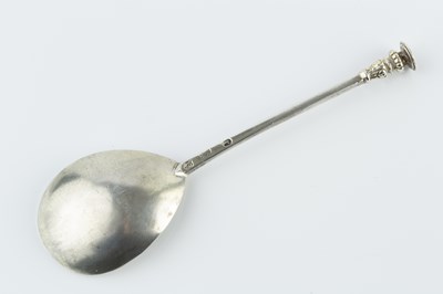 Lot 421 - A James I silver seal top spoon, engraved 1606...