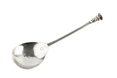 Lot 421 - A James I silver seal top spoon, engraved 1606...