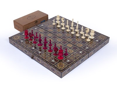 Lot 235 - Two Moorish inlaid mosaic wooden folding chess...