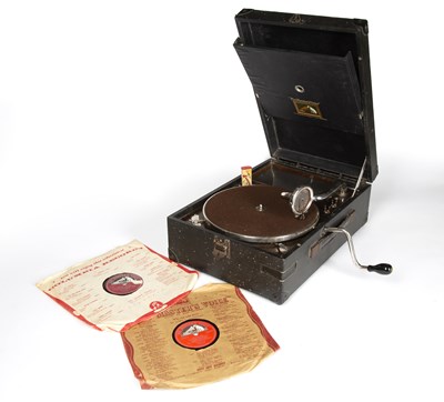 Lot 239 - An HMV wind-up portable gramophone player in...