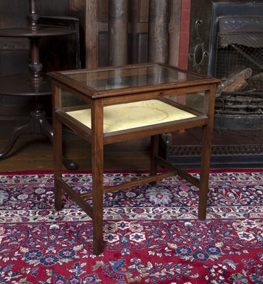 Lot 44 - An Edwardian mahogany display table, with...