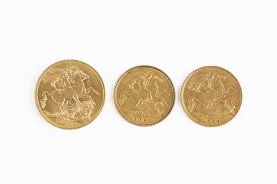 Lot 242 - A George V sovereign, dated 1926, and two...