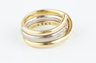 Lot 102 - A diamond set 'Magic' combination ring by...