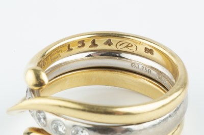 Lot 102 - A diamond set 'Magic' combination ring by...