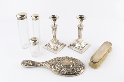 Lot 436 - A pair of Edwardian silver candlesticks, of...