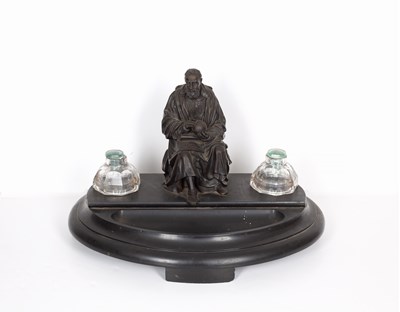 Lot 42A - A 19th century bronze figure of a seated...