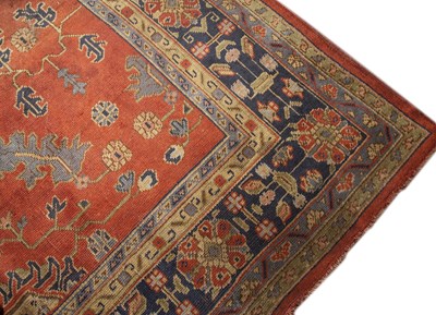 Lot 374B - An old Turkey Oushak carpet with repeating...