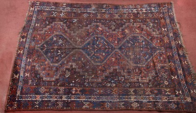 Lot 372 - A Persian Khamseh small carpet with a central...