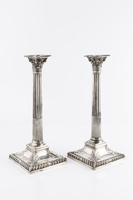 Lot 456 - A pair of George III silver candlesticks, with...