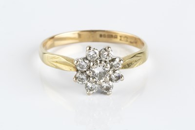 Lot 156 - A diamond cluster ring, the flowerhead cluster...