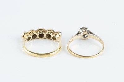 Lot 117 - Two diamond set rings, the first a five stone...