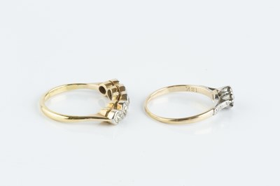 Lot 117 - Two diamond set rings, the first a five stone...