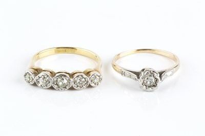 Lot 117 - Two diamond set rings, the first a five stone...