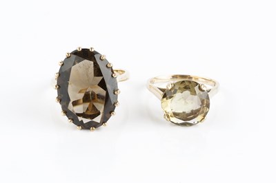 Lot 129 - Two single stone dress rings, the first with...