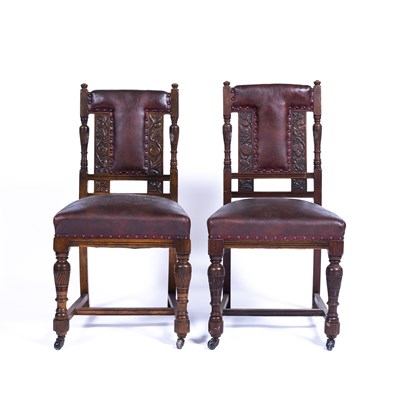 Lot 60 - Arts and Crafts Pair of chairs with carved...