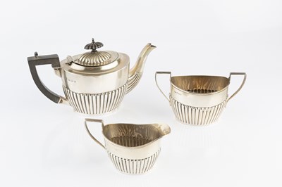 Lot 344 - An Edwardian silver three piece bachelor's tea...