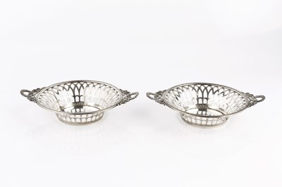 Lot 342 - A pair of Edwardian silver circular sweetmeat...