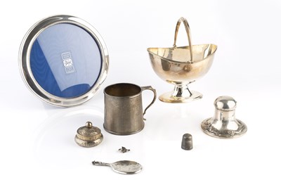 Lot 338 - A silver swing handled sugar basket, with...