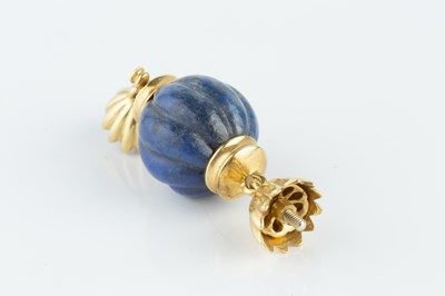 Lot 114 - A hardstone bead clasp, the fluted sodalite...